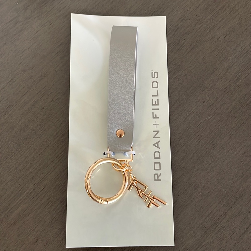 Rodan + Fields wristlet key chain
